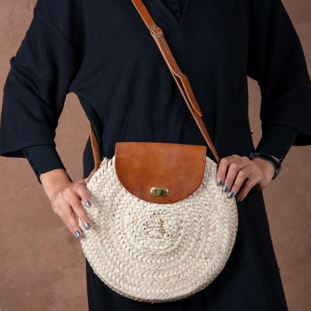 Round straw bag with leather cover by Green Doum, photo 3